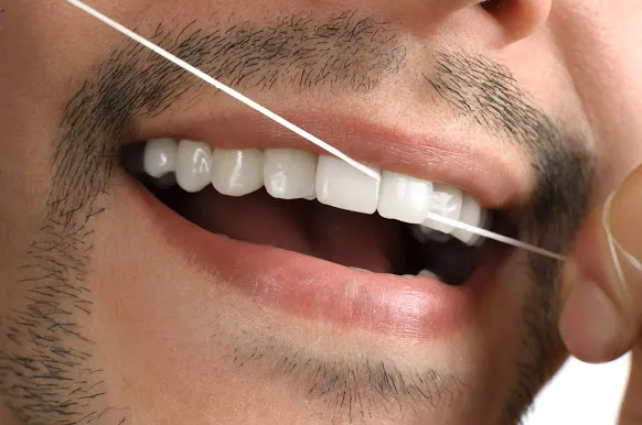 fio dental e higiene bucal